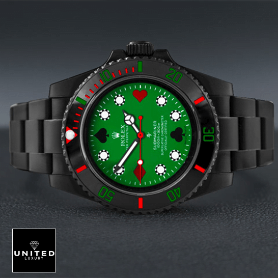 Rolex Submariner 114060 Rolex 114060 Blaken Submariner Poker Green Dial Replica on the table