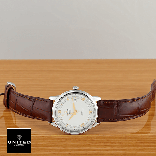 Omega De Ville Prestige 434.13.41.21.03.001 Omega De Ville Prestige White Dial Brown Leather Bracelet Replica on the table