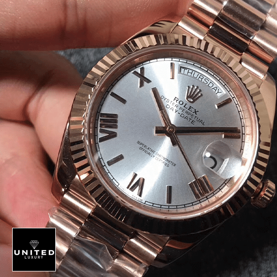 Rolex Day-Date 228235-0016 Rolex day-date roman wihte dial replica on the hand