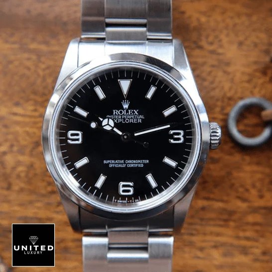 Rolex Explorer 124270 Rolex Explorer 124270 Black Dial Replica on the brown Table