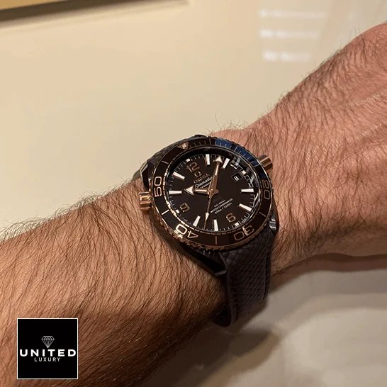 Omega Seamaster Diver Ceramic 215.62.40.20.13.001 Ultra Accurate Clone Omega Seamaster Brown Dial Leather Bracelet Replica on the man wrist