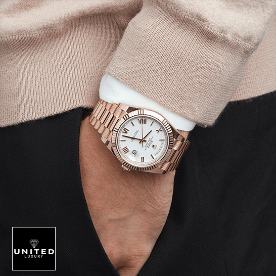 Rolex Day-Date 228235 Rolex Day-Date 228235 Rose Gold Replica on is arm