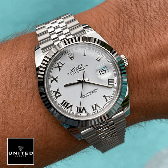 Rolex Datejust 126334 Rolex 126334 Datejust Fluted White Roman Dial Replica on the man wrist
