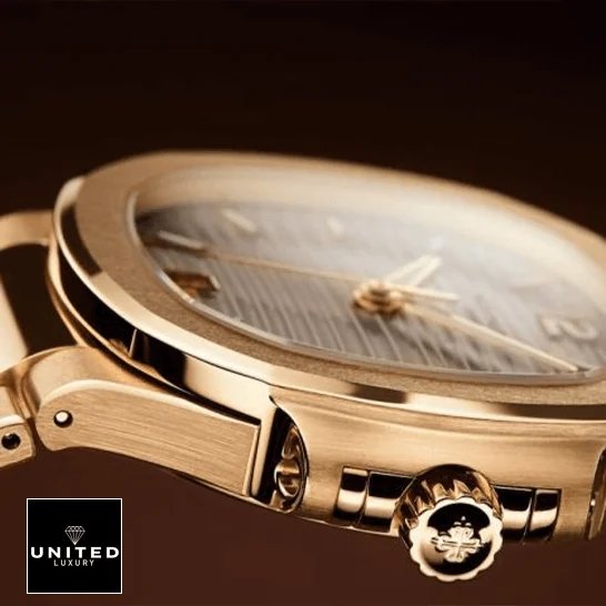 Patek Philippe Nautilus 7118/1R Patek Philippe Nautlus Ladies Golden Rose Replica side view crown on the logo
