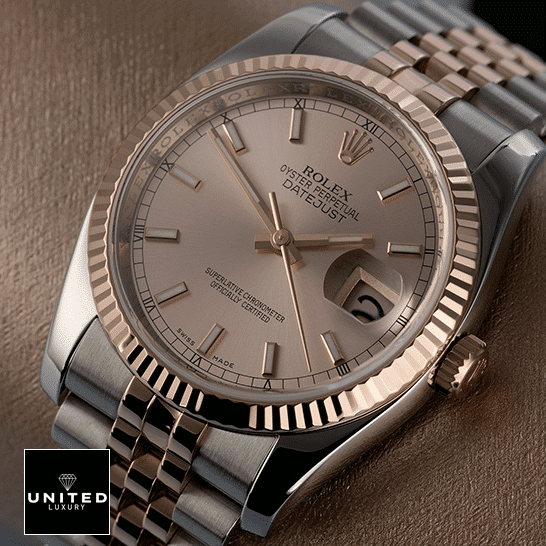 Rolex Datejust 126331-0010 Rolex Datejust Sundust 126331-0010 Rose Gold Fluted Bezel Replica on the table