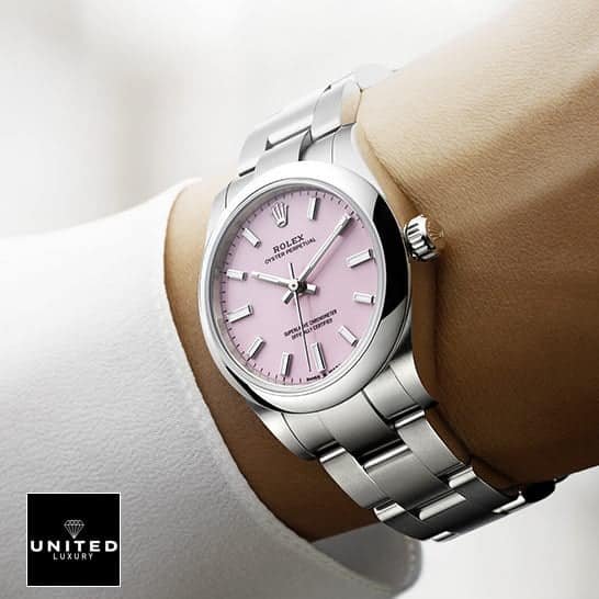 Rolex Milgauss Oyster Perpetual 124300 Rolex Oyster Perpetual 124300 Pink Dial Oyster Replica on his arm