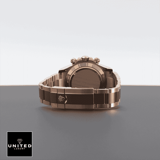 Rolex Cosmograph Daytona 116505 Rolex Daytona 116505-0013 Oyster Bracelet Fold Clasp on the Rolex Logo Replica on the table