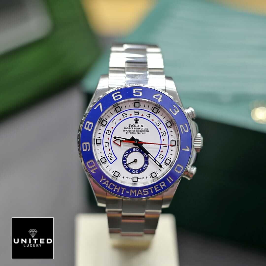 Rolex Yacht-Master II 116680 White Dial High-End Clone Quality Yeni Proje 2 30 Rolex Yacht Master II Oyster Bracelet Replica front view on the stand