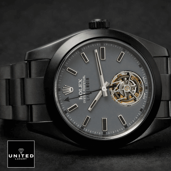 Rolex Label Noir Replica dial is grey in color with stick indeces and ceramic hour markers