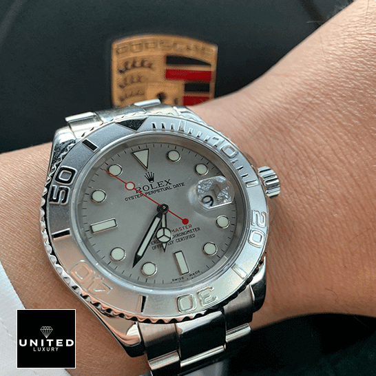 Rolex Yacht-Master 126621 Rolex 116622PLSO Platinum Dial Steel Replica porsche in the background