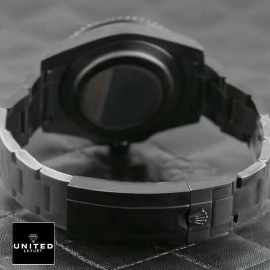 Rolex Blaken Submariner Oyster Bracelet and Clasp on the Black Table